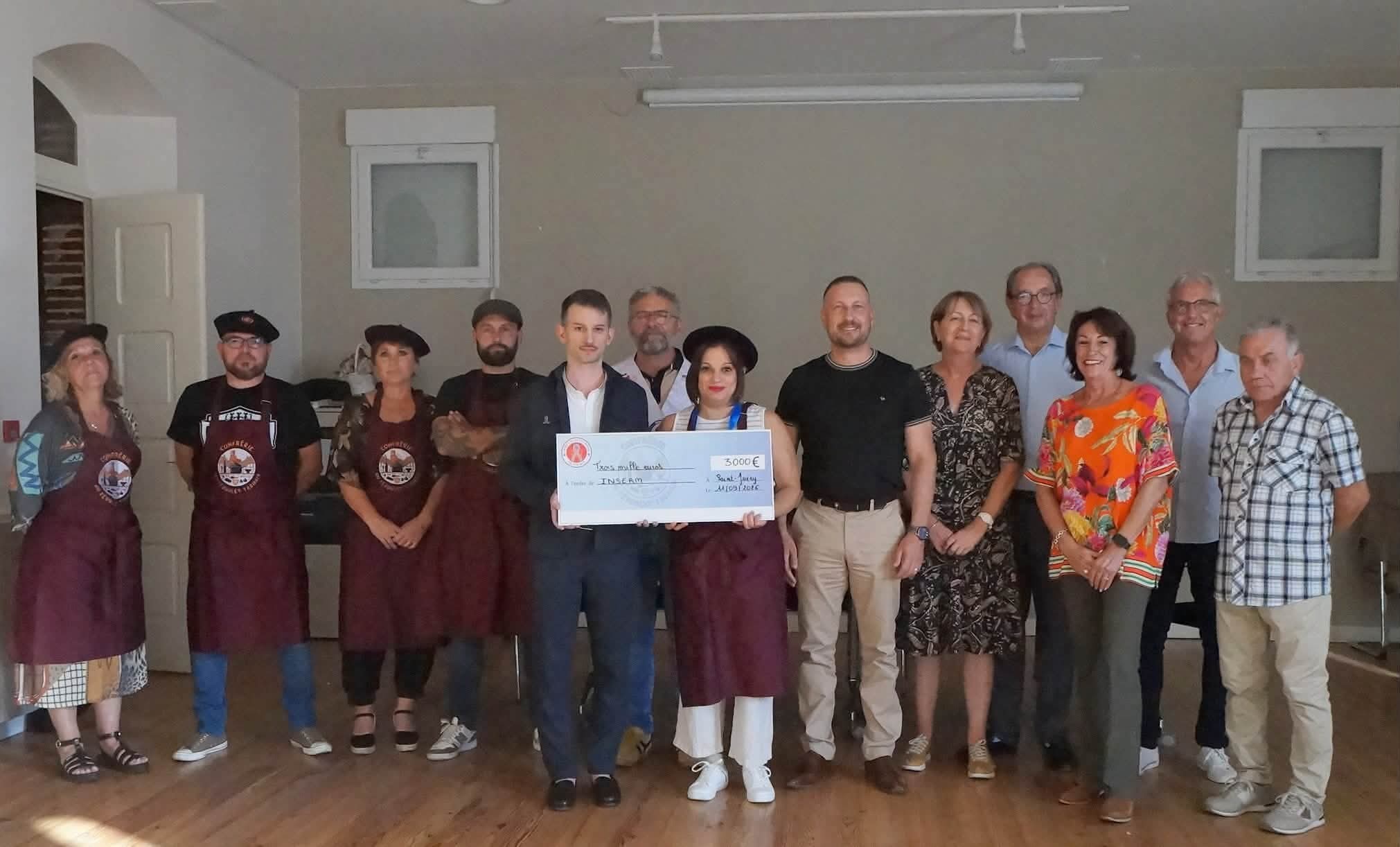 Remise du chèque de 3 000 euros à l'Inserm, à la mairie de Saint-Juéry, le 11 septembre 2026